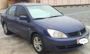 Mitsubishi Lancer 2011 well maintained 1.6L Passing insurance until Sept 2026
