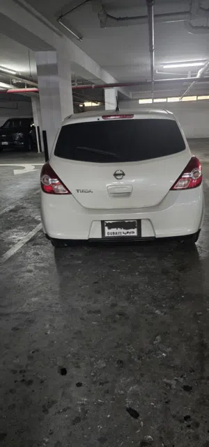 Nissan Tiida 2009 – White – Original Japan.GCCspec -9500aed