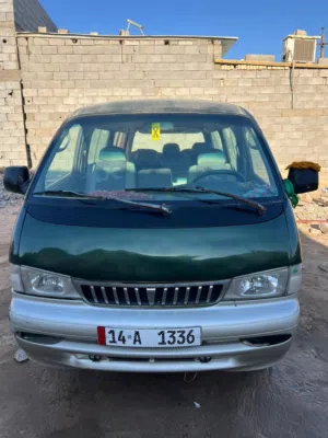 سياره ريجو الفين واحد الاصل رقم انكليزي  راعيها موجود طالب تحويل سياره توه معمره 12 راكب كلشي شغال