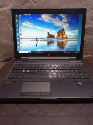لابتوب  hp Workstation 8560w  وياه جنطة مال لابتوب للبيع او استبدال ب ps4