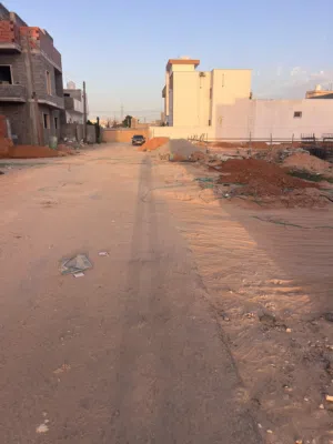 ارض للبيع ممكن تقسيمها الي قطعتين