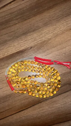 مسباح كهرمان شفاف معى حشرات