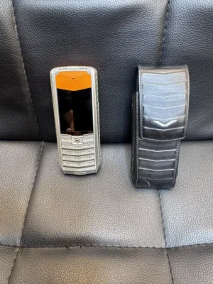 VERTU ASCENT X PEAT ALU RM-589V 2010 CLASSIC BUTTON CELL PHONE - ORANGE
