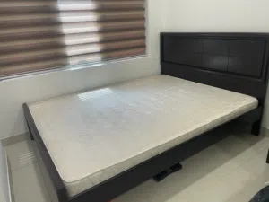 One bed with mattress and one mattress