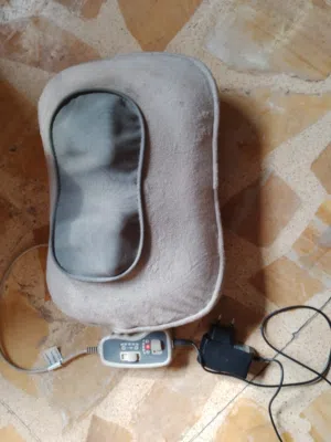 جهاز مساج وتدليك رياضي للرقبه والقدمين بعدة سرع واتجاهات مختلفه يستخدم في السياره أثناء السياقه مريح
