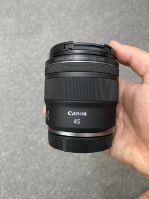 عدسه 45mm 1.2 stm جديد مع كفاله