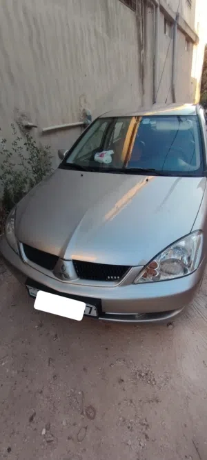 لانسر 2011 شمباني وارد خليجي 1600cc أصلي - صيانة كاملة ونفض جديد جاهزة للاستخدام