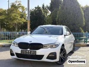 BMW 330e m sport فل الفل، كرت ابيض