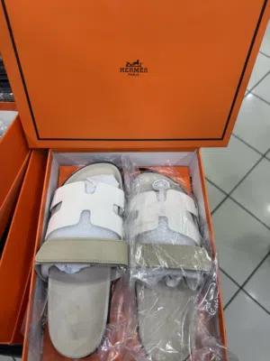 Black And beige Hermès Chypre sandals