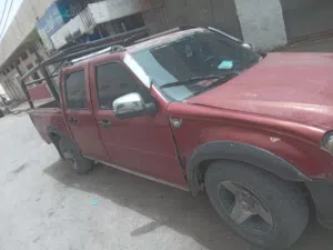 ايسوزو بيك اب 2006 مستعملة بجودة جيدة مع أنوار نهارية وجنوط