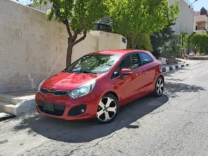 كيا ريو COUPE مميزة فحص كامل 7جيد مالك واحد من الوكيل بحالة الوكالة