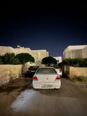 نيسان صني 2013 موديل أبيض، سيارة صالون سيدان مجمركة ومُرخصة للبيع