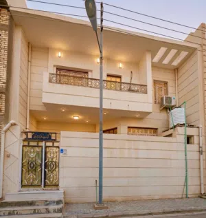 دار للبيع الطويسة مقابل الجسر الاحمر شارع مركز الشرطة