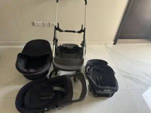 STOKKE twin stroller with three adjustable seats