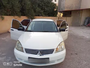لانسر 2013 ماتور اسود 13وكاله يعني 15 خليجي بسعر مغري سياره شغل وامشي  شغل مقنوه مالك واحد من الحره
