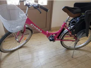 بايسكل مع كرسي اطفال بحاله كالجديده قابل للطي لسهوله التحميل  foldable Bicycle with kid chair