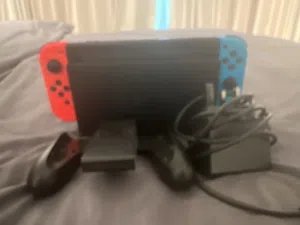 Nintendo switch with dock and charger and a controller