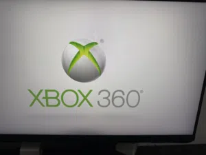 URGENT SALE: Xbox 360 Original (120GB) + Blue Controller + 49 Games Loaded – 250