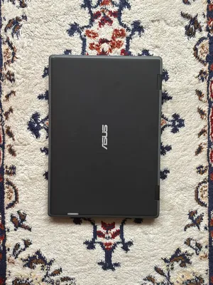 Asus BR1100CKA laptop with charger and bag