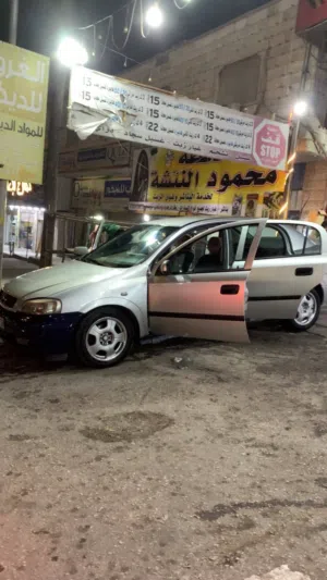 سيارة أوبل استرا 2001 هاتشباك مصفحة ومؤمنة بفوانيس جنوط مرايا كهربائية