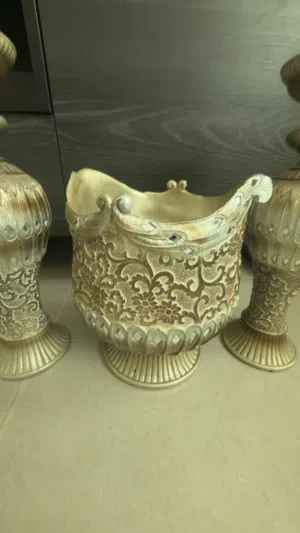 حامل شموع ومزهرية