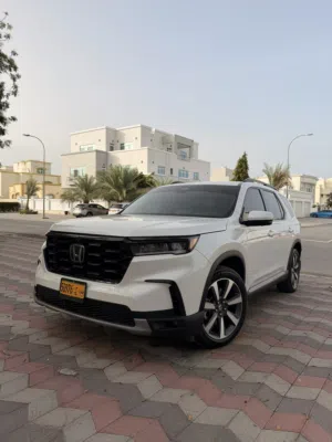 2025-honda-pilot-touring-awd-elite-4x4-full-option-suv