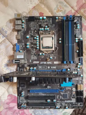 للبيع تجميعة قطع غيار: معالج i5 3470 شغال 100% + بوردة MSI Z77 + كرت شاشة + رام 2 جيجا بحاجة لصيانة