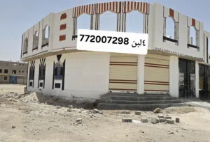 عماره تجاريه بمساحه 4البن ركنيه شارعين14و12 فتحتين تجاريه