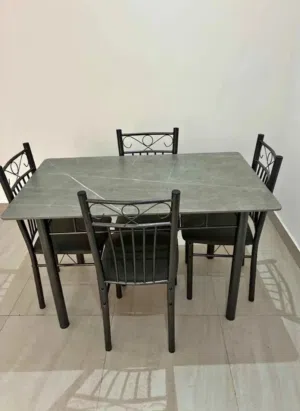 Used like new set of Dining table with chairs as seen in the picture very neat and cleans used