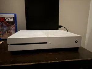 30Bd Xbox one s 1TB everything working good condition no controller only Xbox and Cable