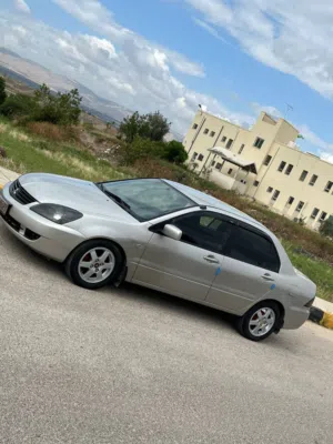 ميتسوبيشي لانسر 2004 موديل GLX فحص كامل بحالة ممتازة