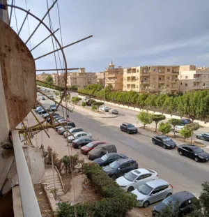 شقة 113م بكمبوند الفردوس مميزه بحري فيو مفتوح غير مجروحة تري طريق الواحات دور تاني تشطيب سوبر لوكس