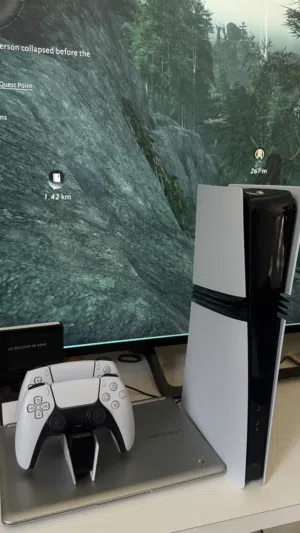 ps5 pro with 2 controllers and games