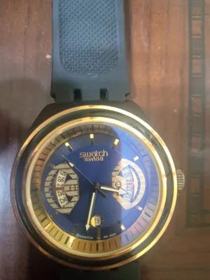 Swatch . Analog Quartz . Black4