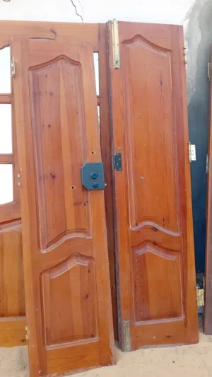 أبواب حديد واعمدة مضلله ورواشن أبواب لوح