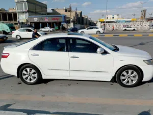 تويوتا كامري 2009 للبيع ابيض اللون رقم بغداد