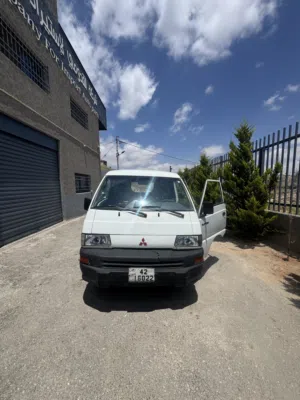 باص ميوتسبيشي L200