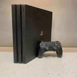 Ps4 pro ba9i be cartona jedid fih 150 lo3ba we manette original v2