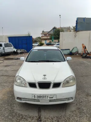السلام عليكم دايو لستي 2004 2005 محرك 16 كامبيو 100 100 محرك 100 100 مارش عاديه طبي مقص خلفي يمين 9