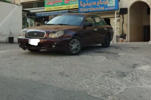 سيارة هونداي سوناتا 2003 ماتور 2000  فل مع فتحة وأوتوماتيك لون خمري مرخصة ومأمنة