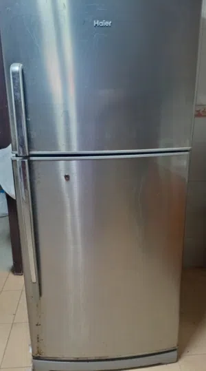 fridge and electric stove and oven