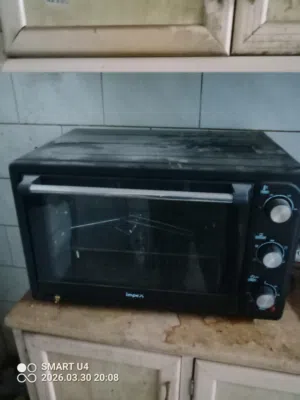 ادوات مطبخ عباره عن ثلاجه صغيرة استعمال خفيف وحله طبخ كهربائىة لم تستعمل مع فرن كهربائي خلاط ومطحنه