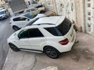 Mercedes Ml 320 2009 ماطور 3000 ديزل  4*4 دفع رباعي  لون ابيض مميز  جيب نظيف