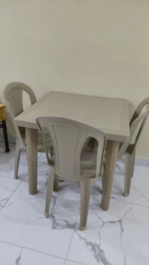 Plastic table with 3 chair