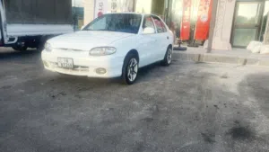هونداي اكسنت هاتشباك لون ابيض موديل 1998 للبيع