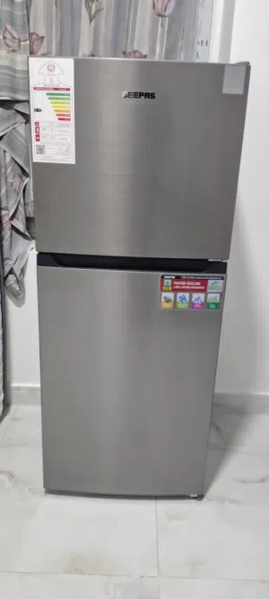 Refrigerator and gas cylinder