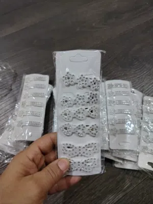 كارتون يحتوي ع 60 قطعه  طباقيات شعر بناتي