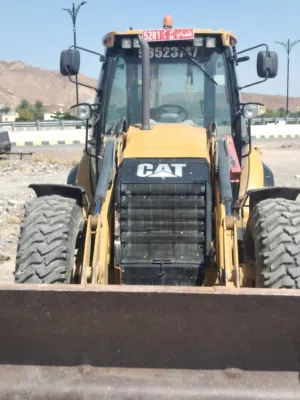 CAT JCB 2013 for sale in rustaq, asking price   13000 riyal..... phone number.                  9852