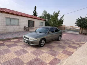 لانسر تب نظافه ترخيص سنه وعشره ايام سياره بصلاه النبي شغل وامشي