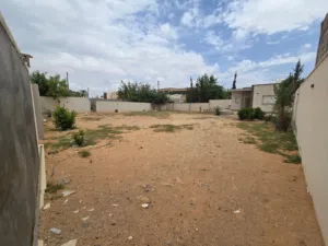 قطعه ارض طريق المشتل خلف سوق الغزيوي